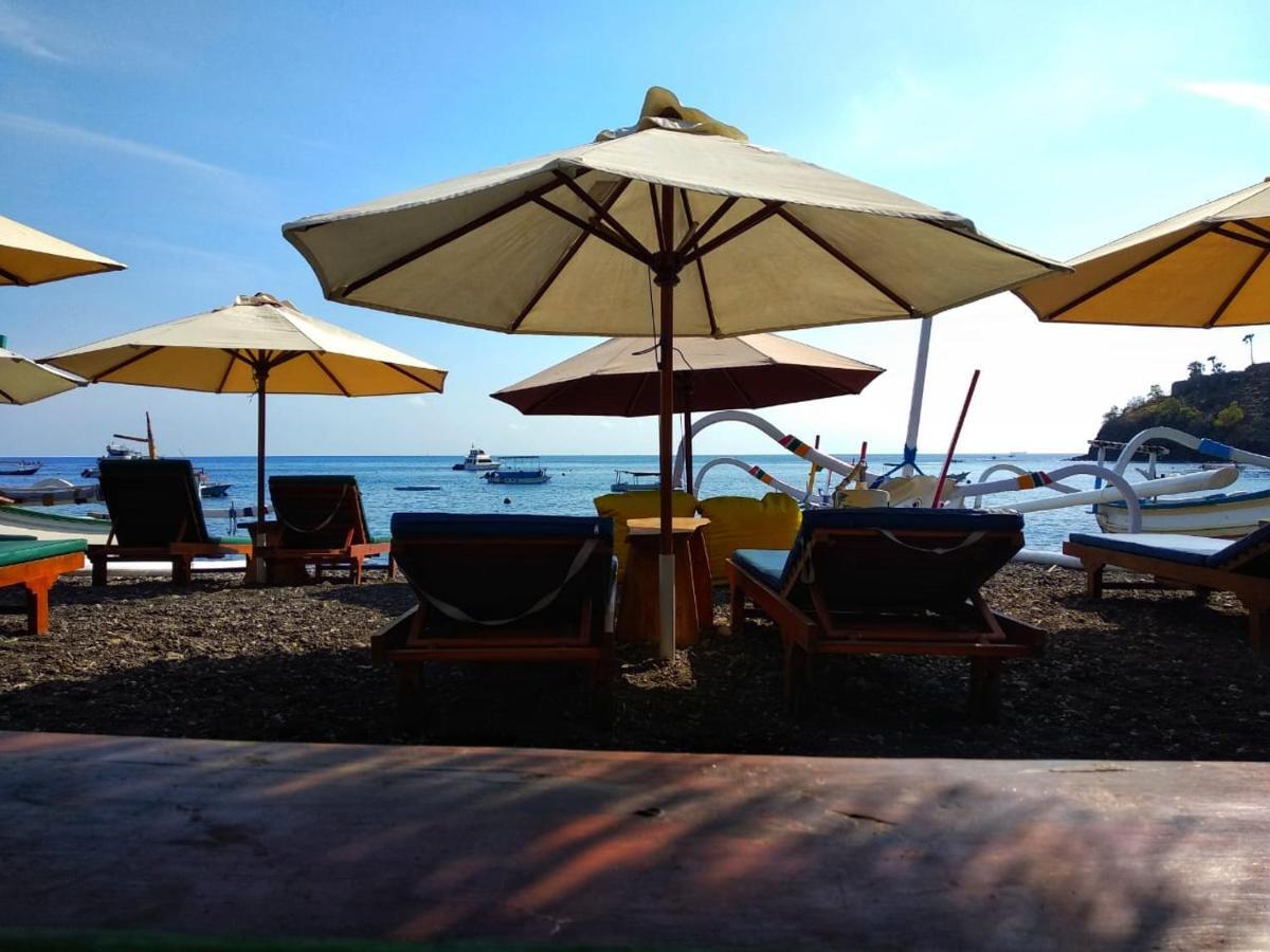 Coconut Beach Bungalows & Warung อาเม็ด ภายนอก รูปภาพ