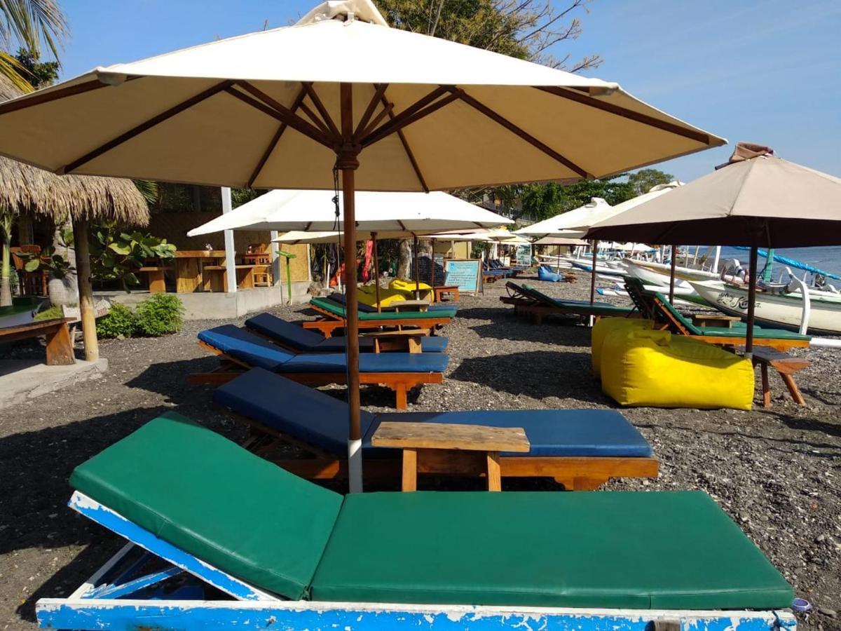 Coconut Beach Bungalows & Warung อาเม็ด ภายนอก รูปภาพ